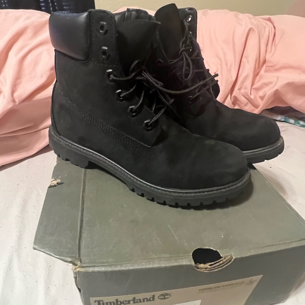Black worn timberlands